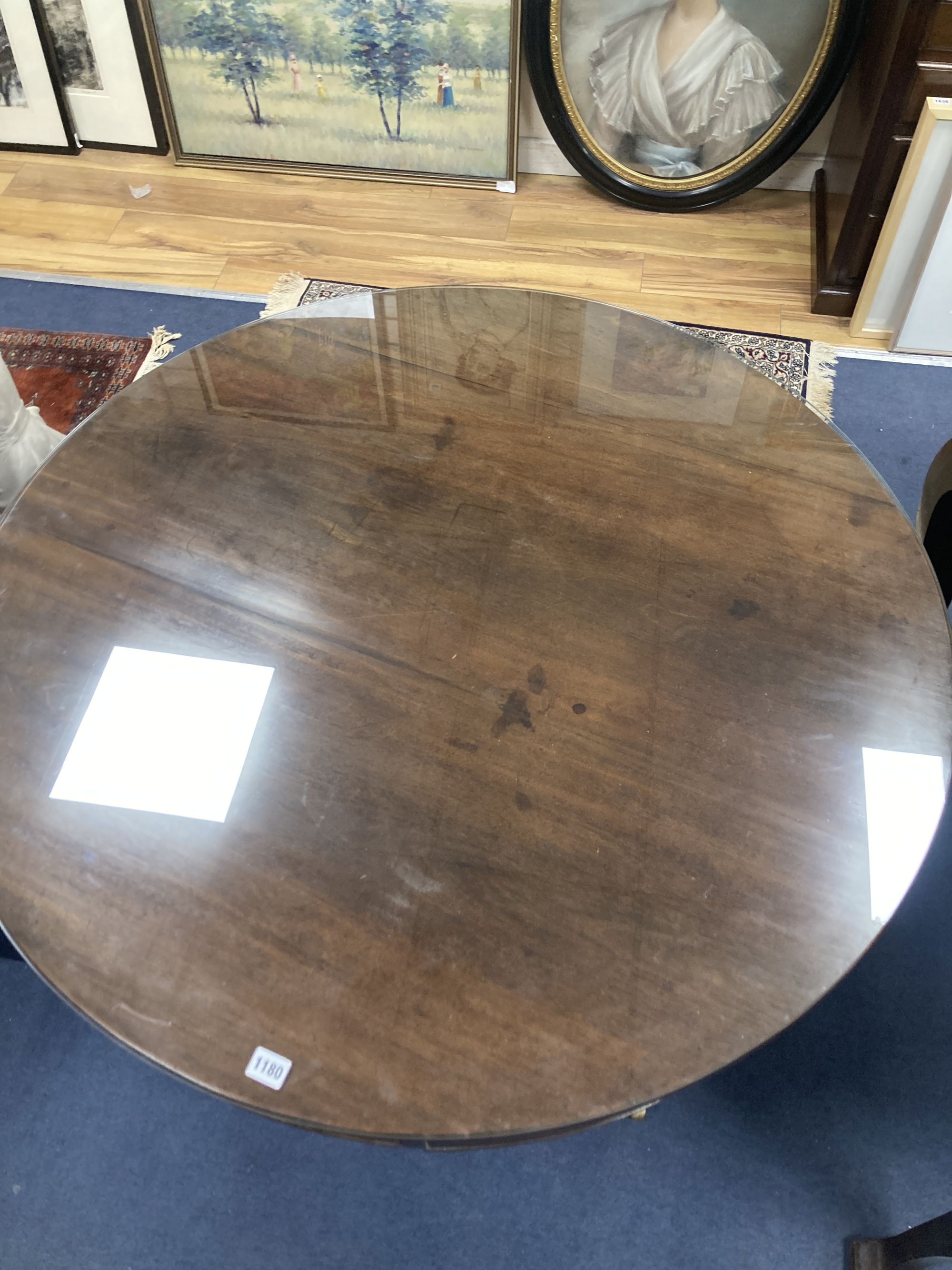 A Regency mahogany drum top library table,